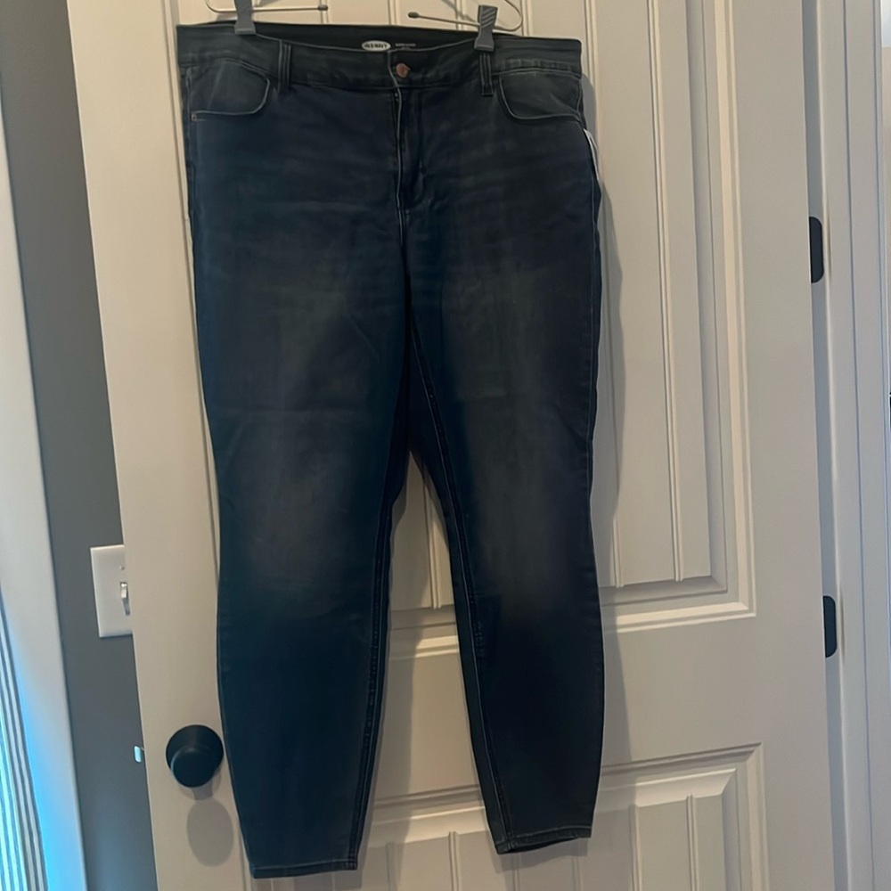 Super skinny mid rise jeggings, medium wash.